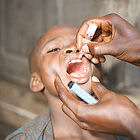 Child vaccinated against polio, Guinea